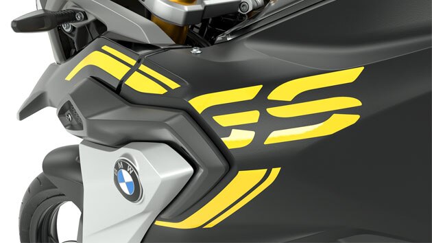 We see the GS lettering and the tape design on the black tank.