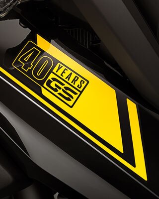 We see a close-up of the 40 Years GS sticker.